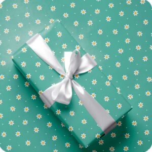 PAPEL REGALO 65X95 70 GRS MARGARITAS  X20